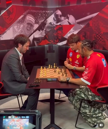 Teymur Rajabov plays chess with F1 pilots in Baku