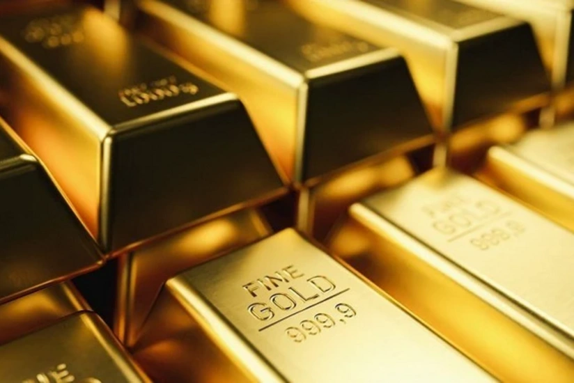 Золото подешевело на фоне неопределенности по ставке ФРС США