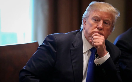 Questions arise over strikingly similar signatures by Trump on recent pardons