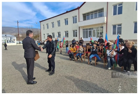 Keys to new homes presented to residents returning to Tazabina village of Khojaly