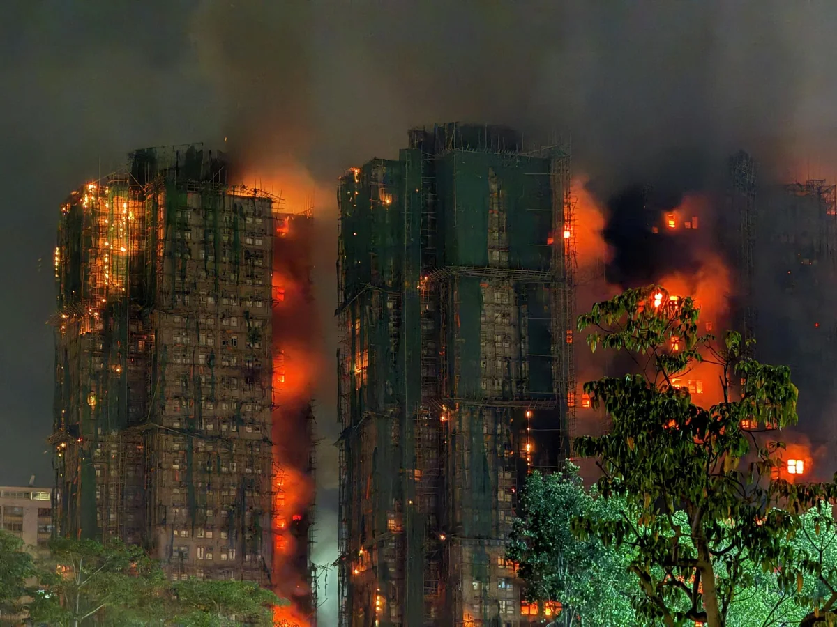 Hong Kong to pay families of fire victims HK$ 200,000 — about US $ 25,700
