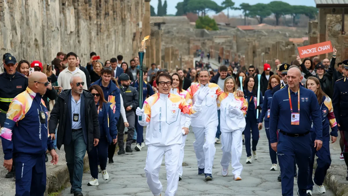 Jackie Chan carries 2026 Milano Cortina Olympic torch through ruins of Pompeii