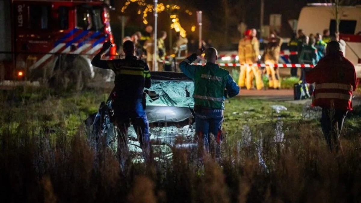 Car hits people waiting to watch a parade in a Dutch town, injuring 9