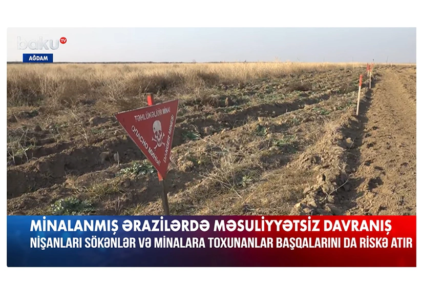 Residents in Azerbaijan's Aghdam remove mine warning signs - VIDEO