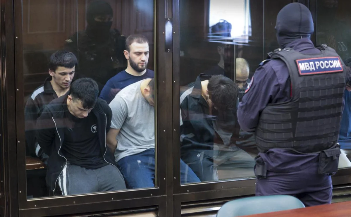 Crocusda terror aktı işi üzrə təqsirləndirilənlərə ömürlük həbs istənilib