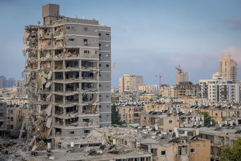 Four killed in Syria after debris from Iranian missile strikes residential building