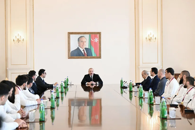 President Ilham Aliyev receives wrestlers who won European Championships in team standings