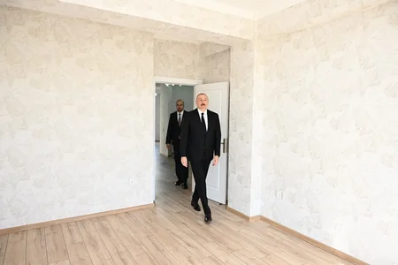 İlham Əliyev Zəngilan şəhərində inşa olunmuş ilk yaşayış kompleksinin açılışında iştirak edib