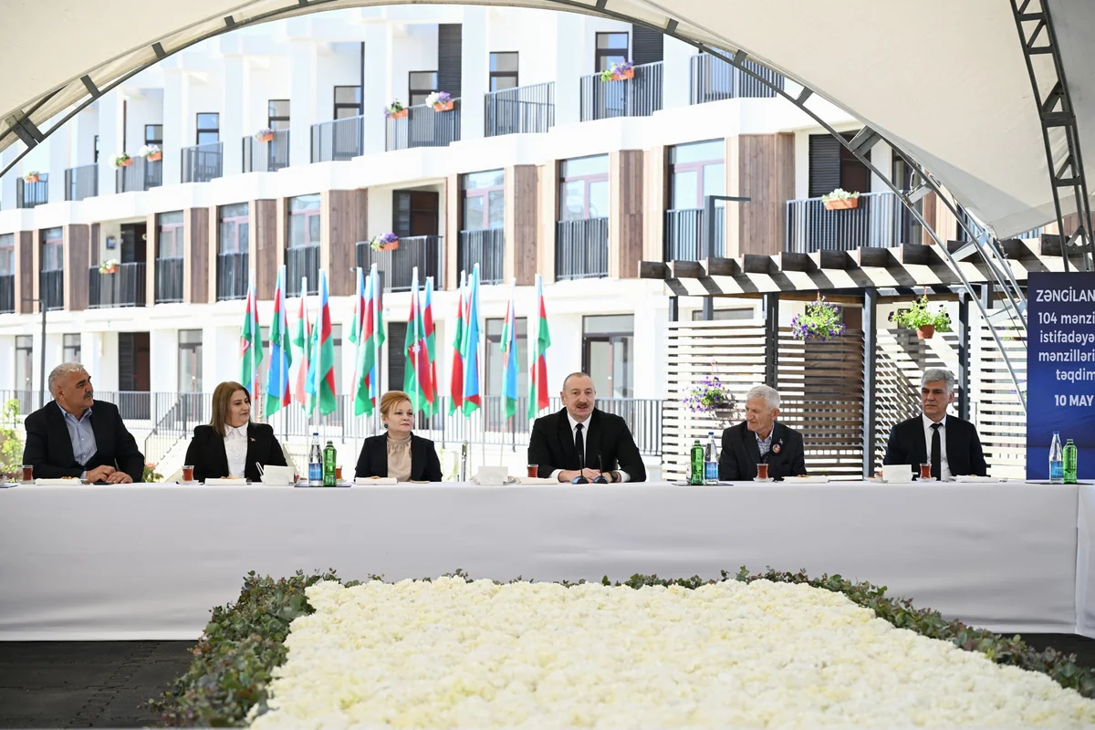 Prezident İlham Əliyev Zəngilan şəhərindəki ilk yaşayış kompleksinə köçən ailələrlə görüşüb - YENİLƏNİB