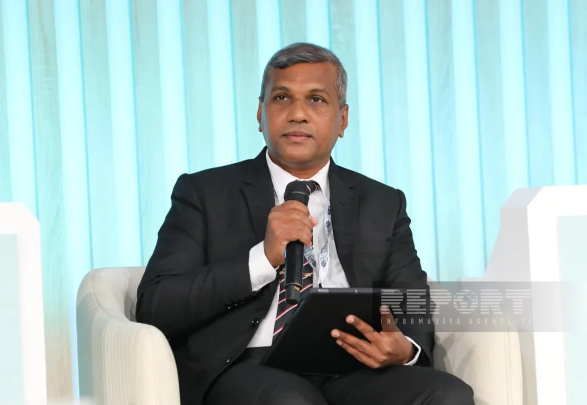 Sri Lanka's minister speaks at WUF13 about plans to build 10 satellite towns to ease congestion in Colombo