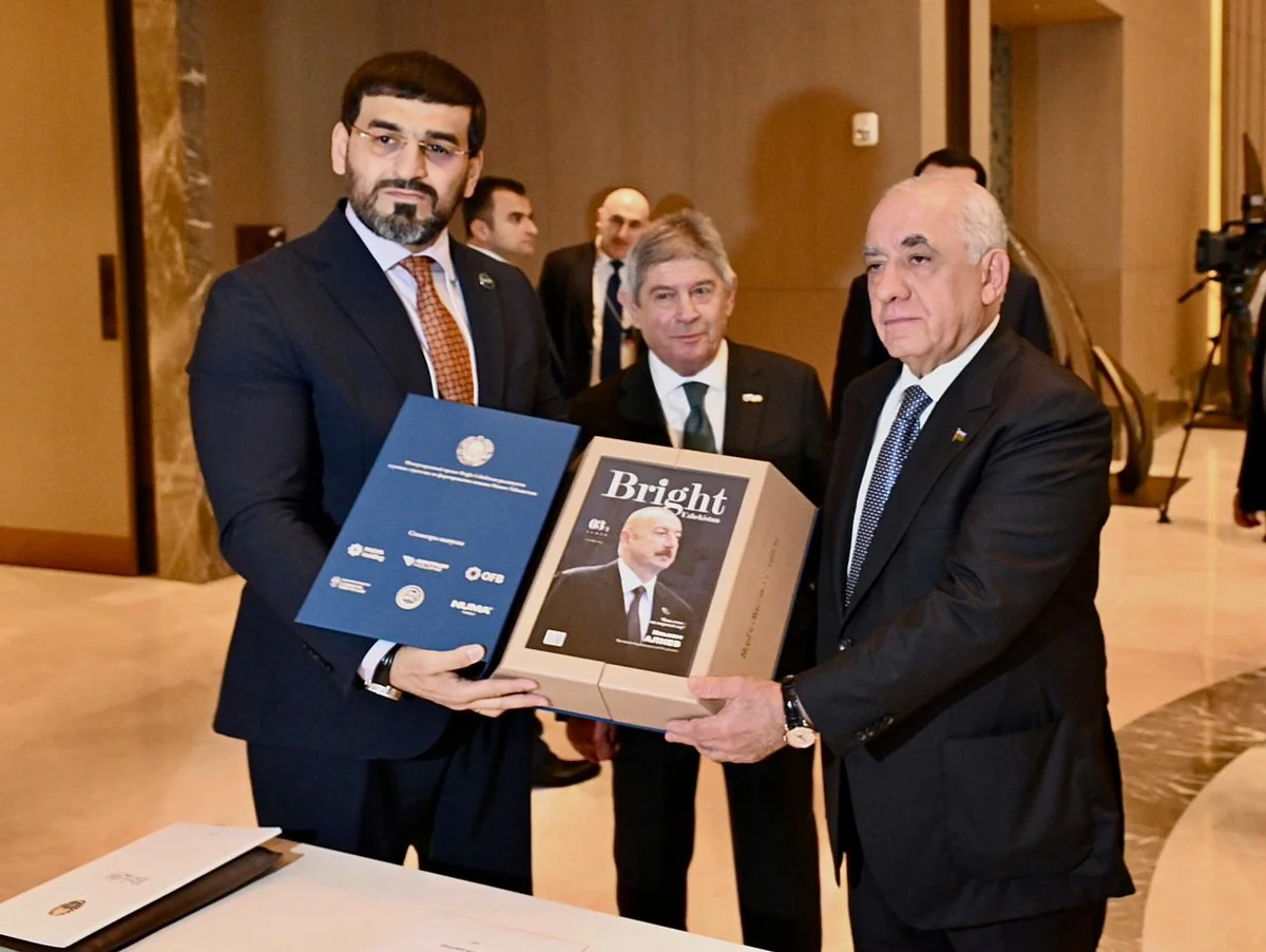Ali Asadov presented with special issue of Bright Uzbekistan magazine