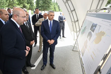 Members of Coordination Headquarters review Aghdara master plan