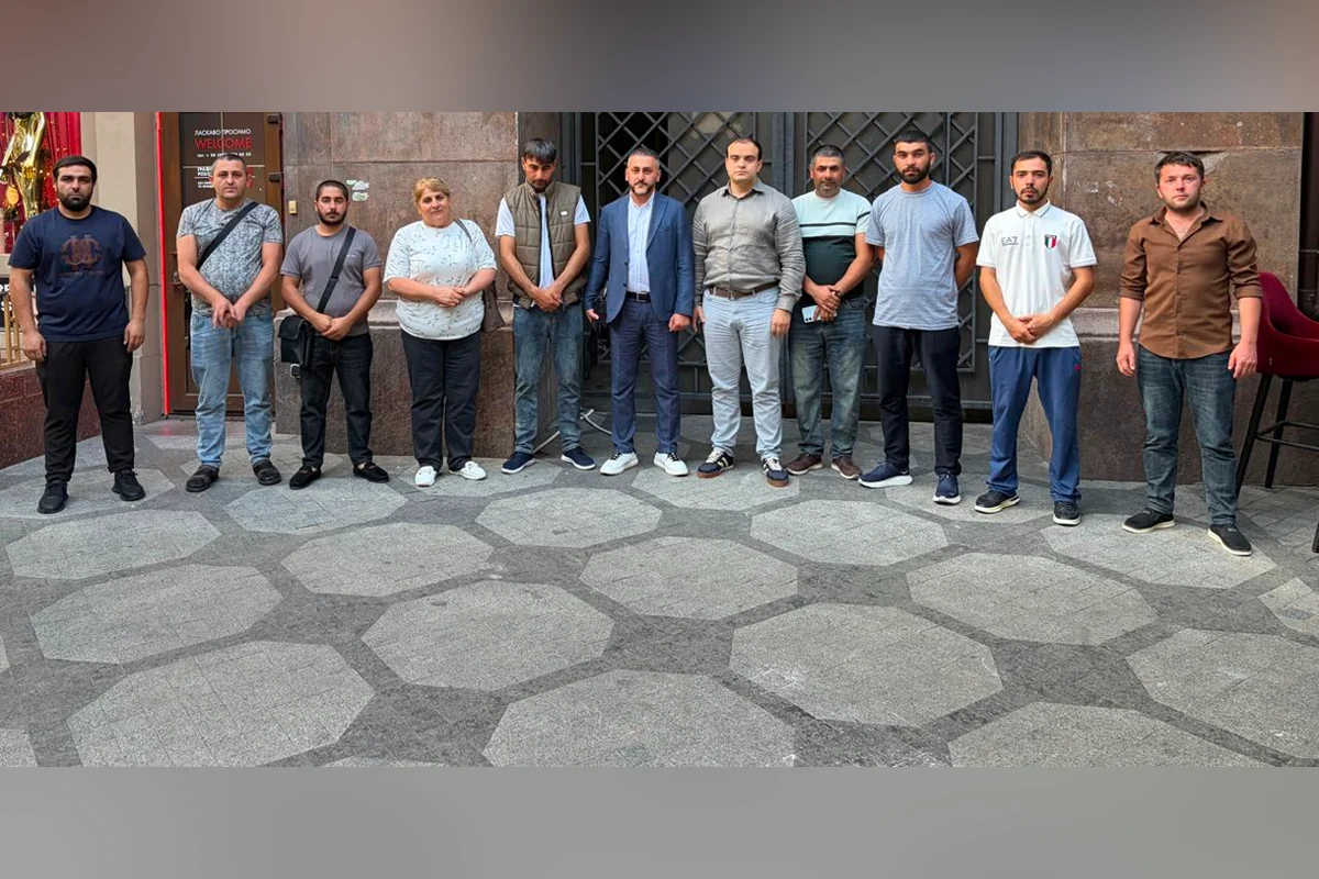Ten Azerbaijani crew members rescued from drone-hit ship leave Ukraine