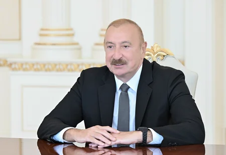 President Ilham Aliyev receives John Deere delegation