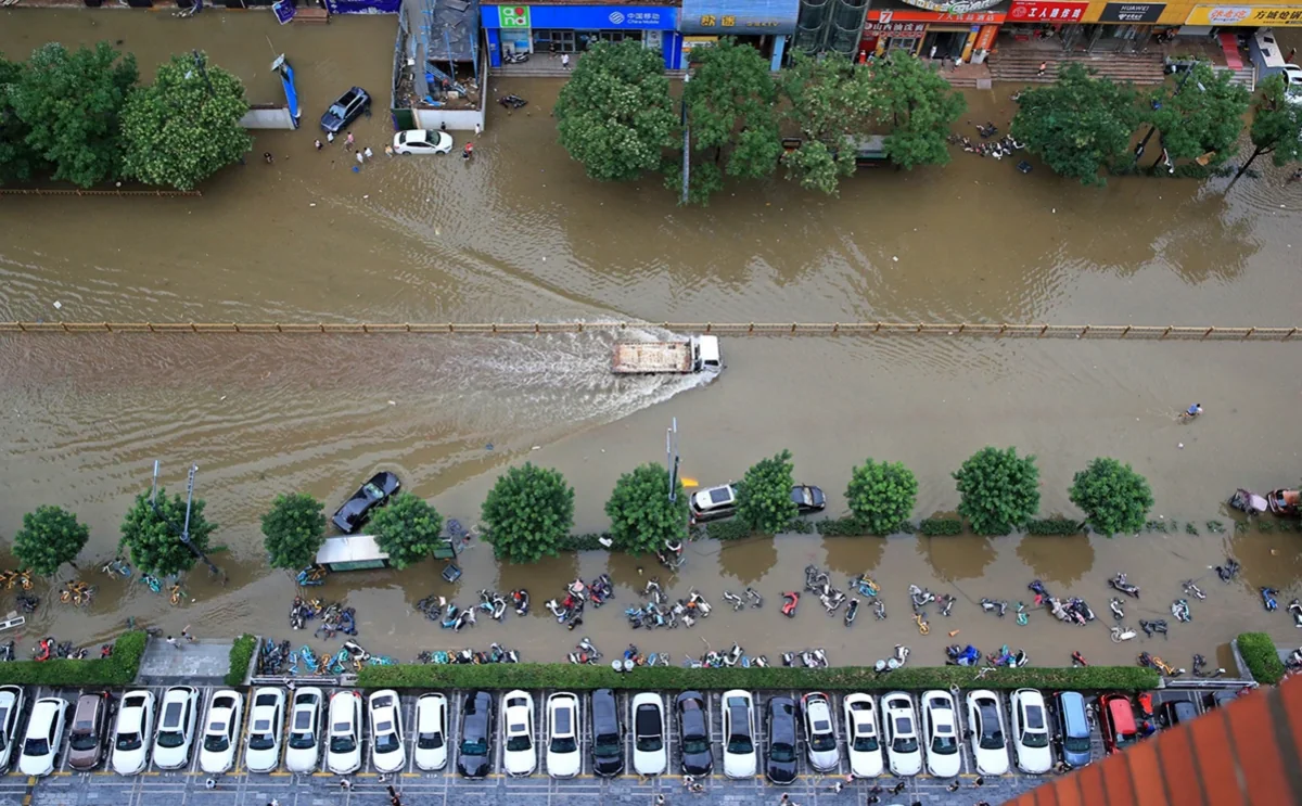 10 killed and nearly two dozen injured after flash floods hit tourist site in northwestern China