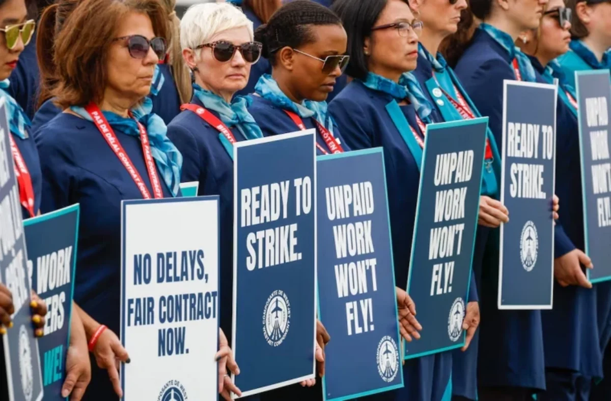 Flight attendants at Canadas WestJet go on strike in dispute over pay