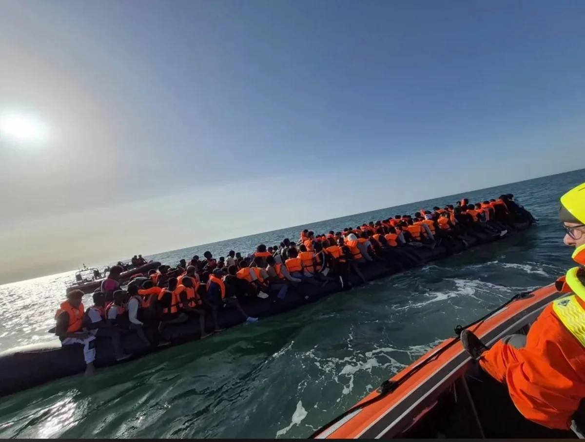 Record 230 migrants cross English Channel in one boat
