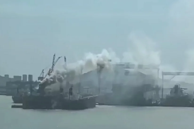 At least 20 reported dead and 5 missing after cargo ship catches fire in China port