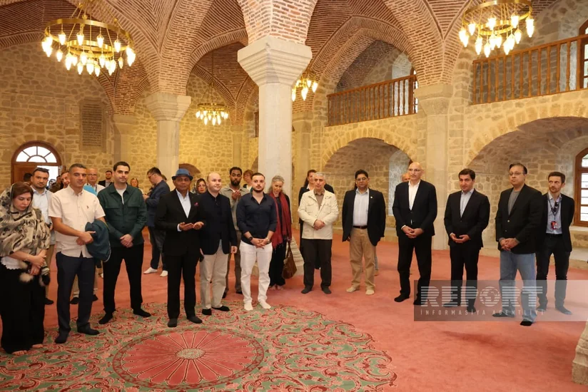 Diplomats from Muslim countries perform prayers at Yukhari Govhar Agha Mosque in Azerbaijan's Shusha