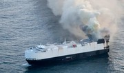 Ship carrying EVs abandoned in Pacific after catching fire