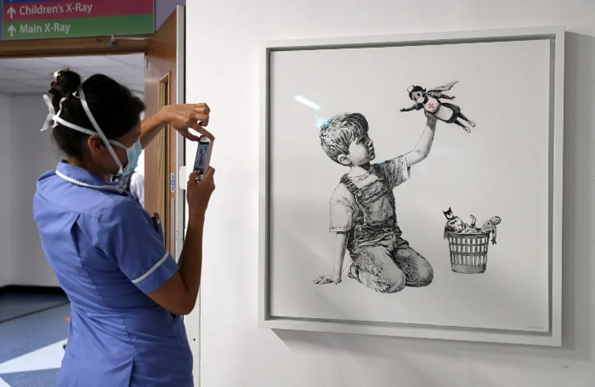 Banksy to auction painting drawn in hospital