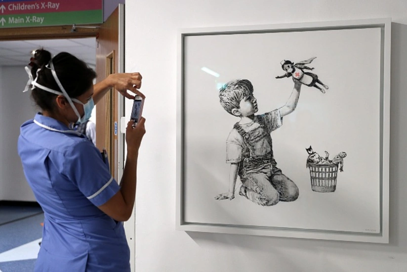 Banksy to auction painting drawn in hospital