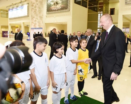 President Ilham Aliyev views Bakutel 2018 exhibition