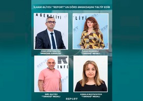 President Ilham Aliyev awards Report's news team