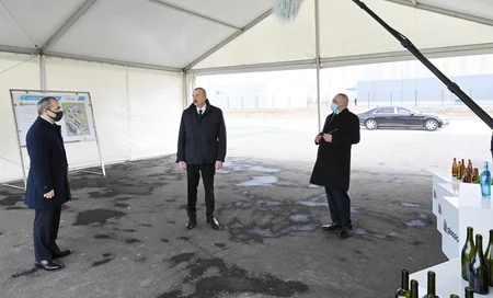 Президент заложил фундамент двух заводов и открыл предприятие в Сумгайыте