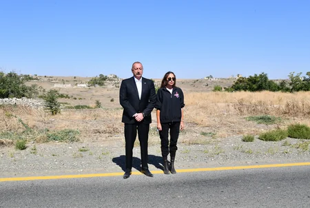 Ilham Aliyev and Mehriban Aliyeva visit memorial plaque dedicated to Remembrance Day in Qarakhanbayli