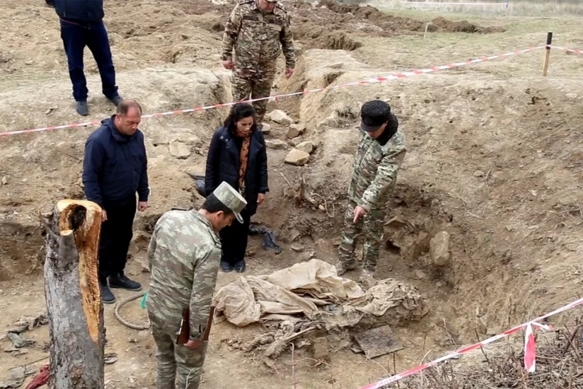 Azerbaijan's military prosecutor visits mass graves found in liberated territories 