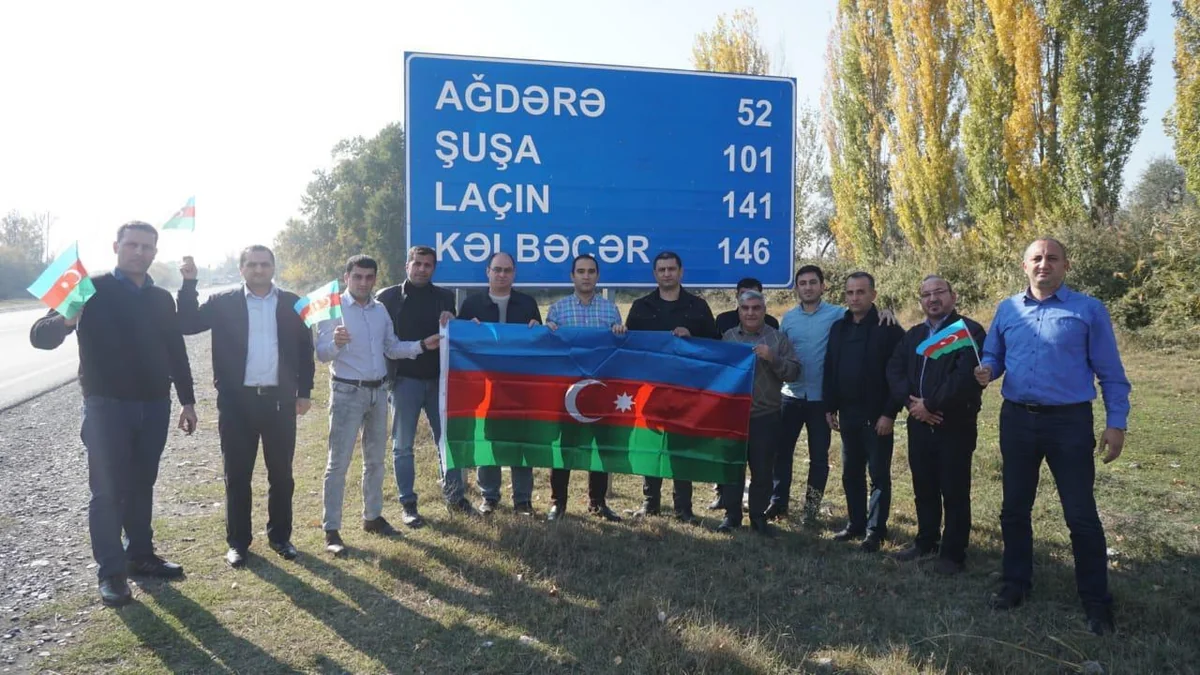 Parlament jurnalistləri cəbhə bölgəsində bayraq aksiyası keçiriblər - FOTOREPORTAJ