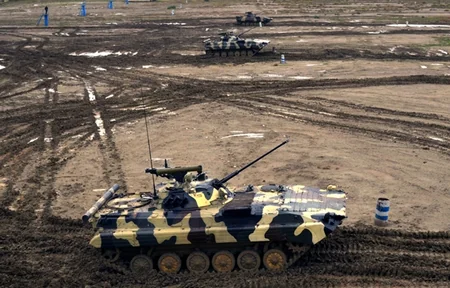 Armored vehicles battle shooting exercises started in frontline zone