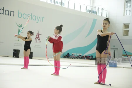 Bölgə gimnastlarının Milli Gimnastika Arenasında məşqləri davam edir
