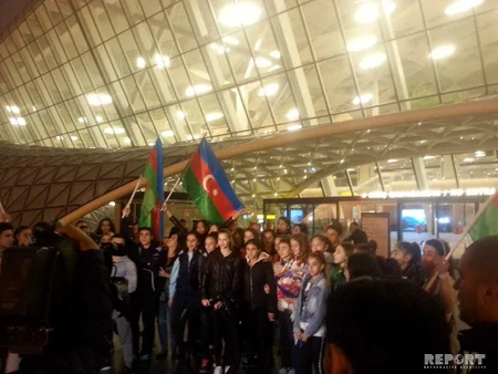 Olimpiadada iştirak etmiş Azərbaycan idmançıları Bakıya qayıdıblar - FOTO