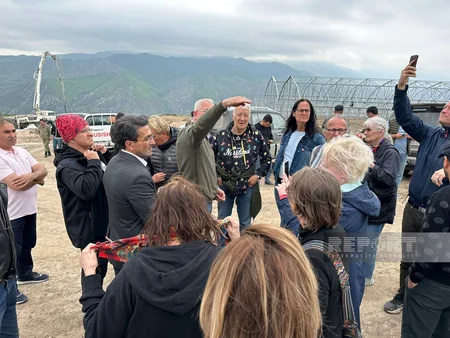 Swedish travelers view restoration work in Lachin