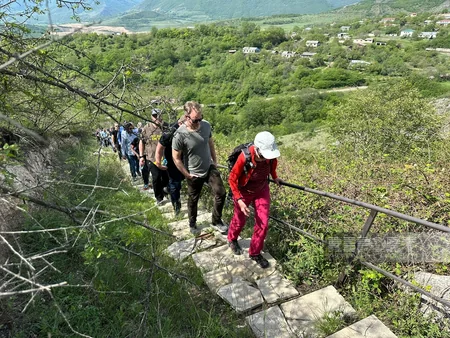 Famous travelers visit Azykh cave