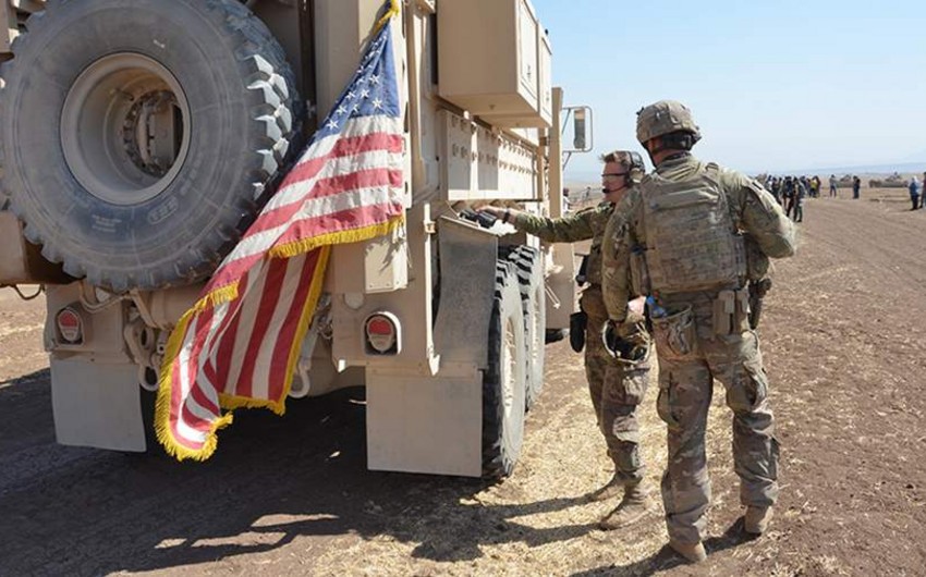 US withdraws troops from two more bases in Syria