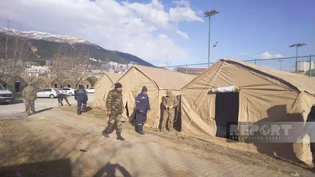Azerbaijani rescuers setting up another temporary tent camp in Kahramanmaras