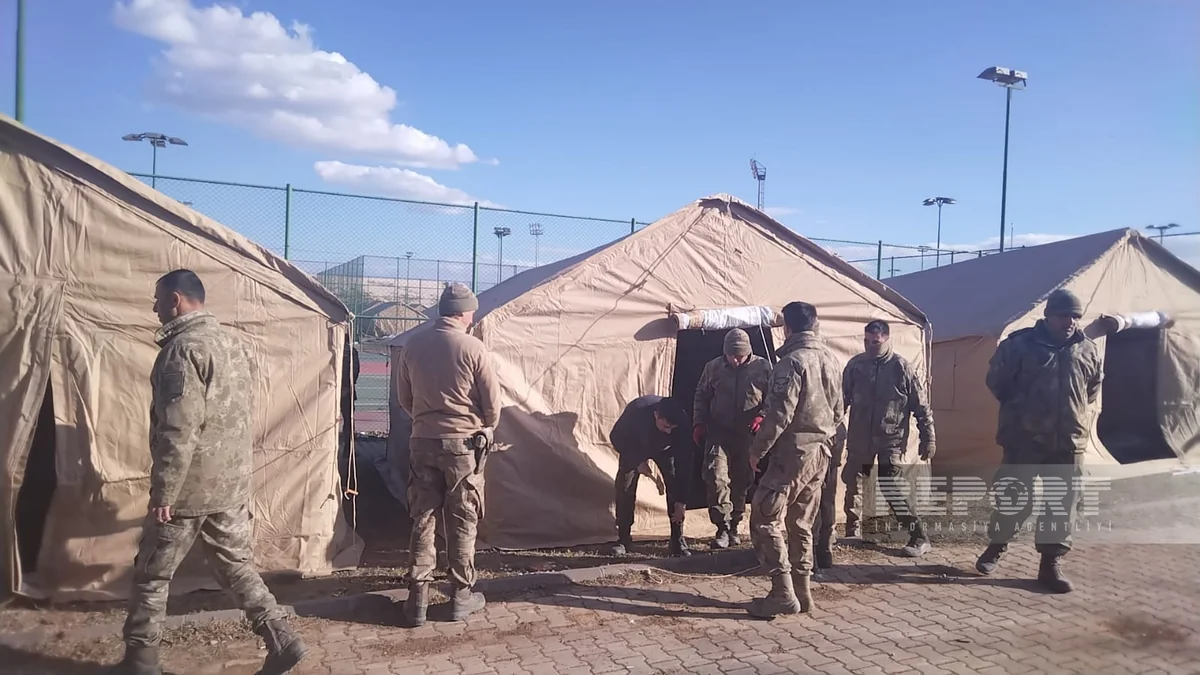 Azerbaijani rescuers setting up another temporary tent camp in Kahramanmaras