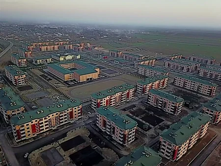 President Ilham Aliyev views new residential complex for IDPs in Tartar district