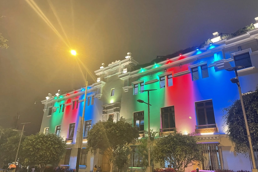 Municipal building in Peru illuminated with colors of Azerbaijani flag