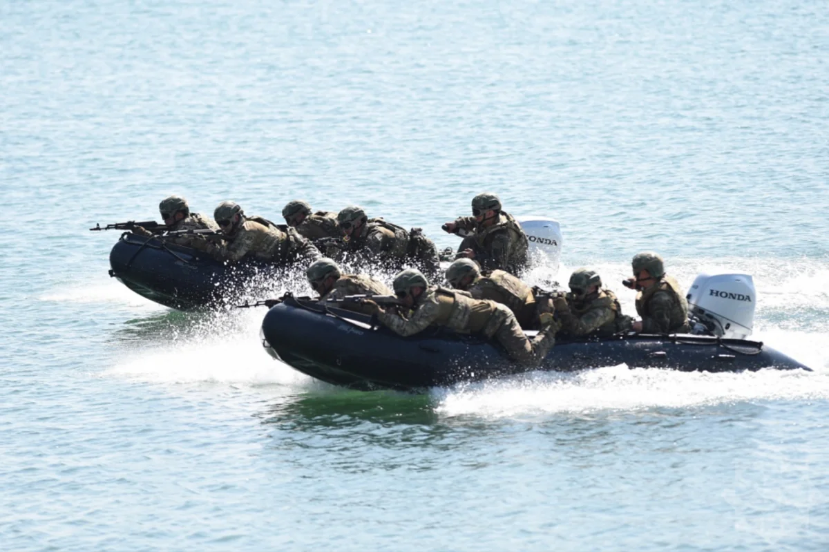 US Marines in Okinawa start moving to Guam under realignment plan