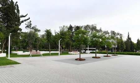 President Ilham Aliyev views conditions created at newly-reconstructed park in Baku
