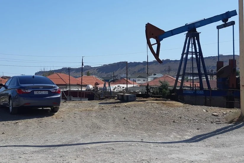 Torpaq zəbt etdi, polislər gələndə bacısının arxasında gizləndi