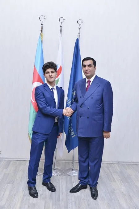 BHOS students distributed notebooks on Oil Workers Day