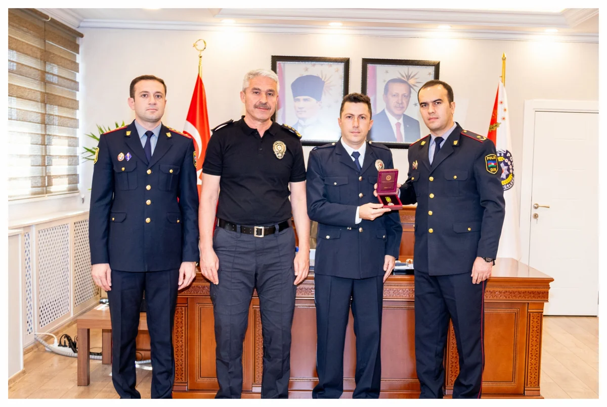 DİN Ermənistanla matçda Azərbaycan Bayrağına göstərdiyi ehtirama görə türkiyəli polisi təltif edib