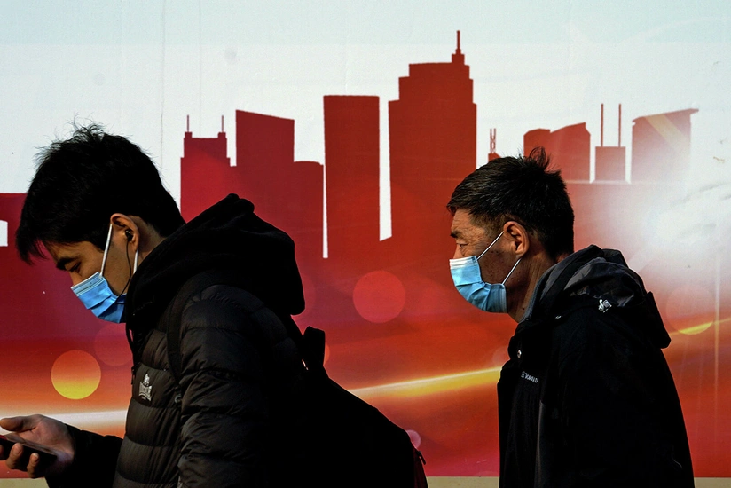 China asks residents in 2 cities to stay home