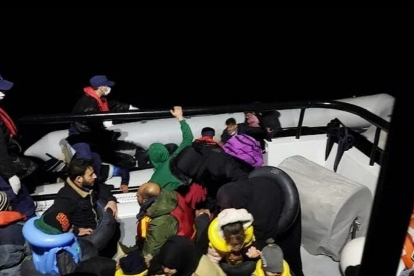 Turkish coast guard rescues dozens of migrants