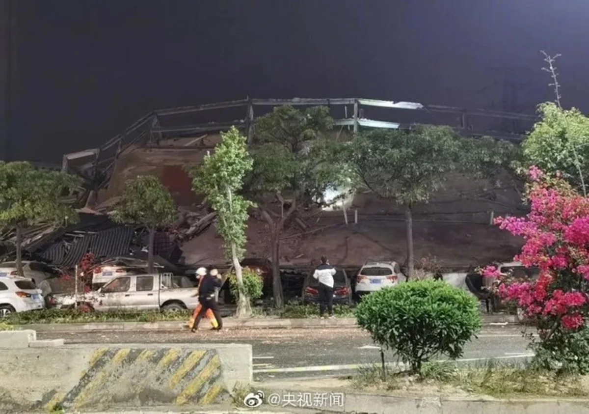 Hotel building collapses in China, trapping people